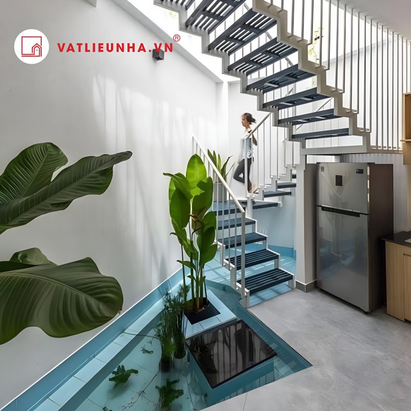 hóa giải phong thủy bể cá gầm cầu thang